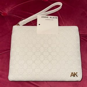 NWT Anne Klein pouch/clutch/wristlet wallet, in ivory. Nice monogram details.
